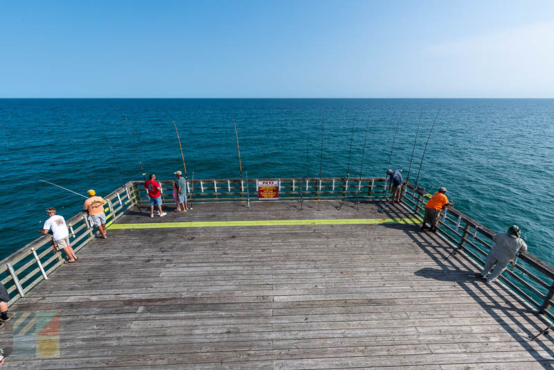 Fishermen surround the end of the Bogue Inlet Fishing Pier
